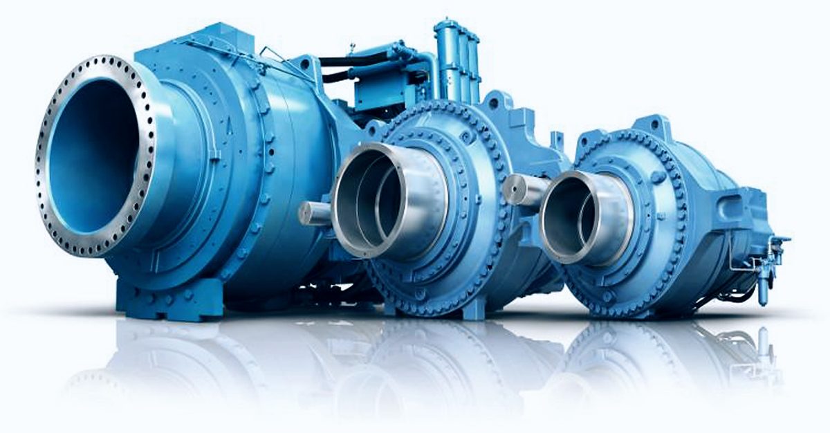 Three blue wind turbine gearboxes